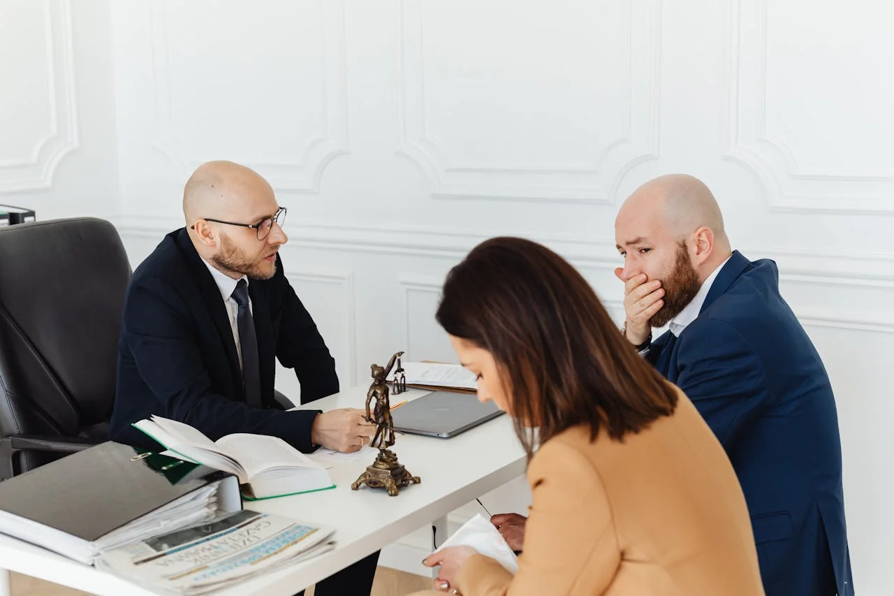 Legal advisor explaining documents to client — How LawSupport Works